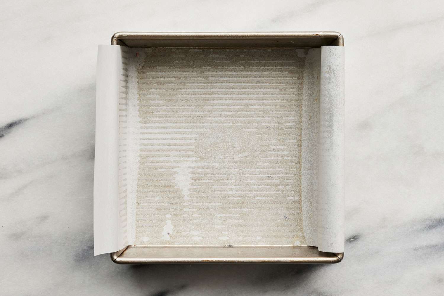 square baking pan lined with parchment paper
