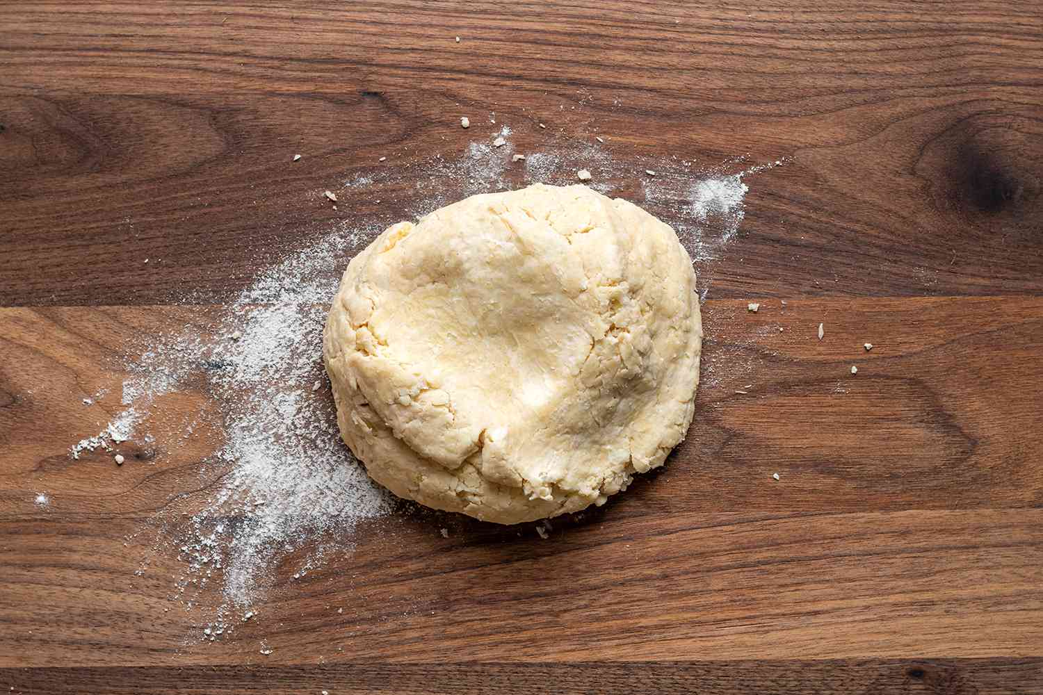 pastry dough on a wood board