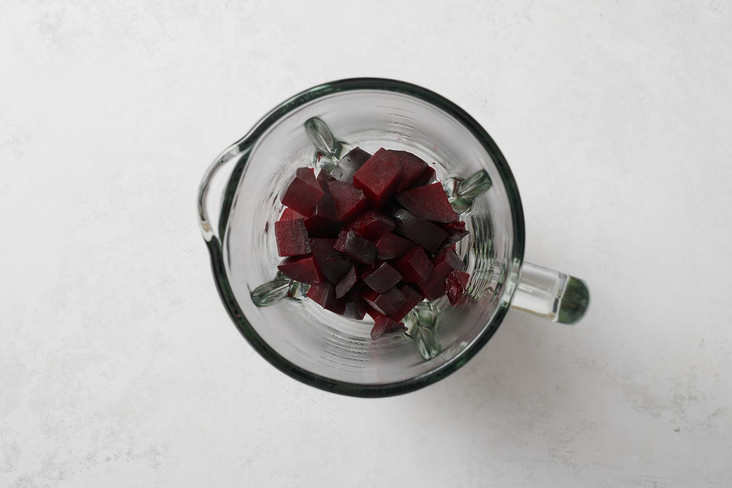Cubes of beets in a blender