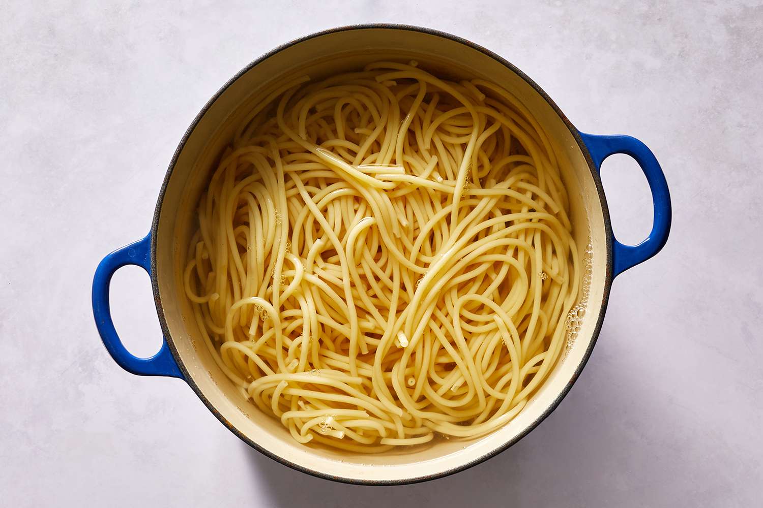 Pasta cooking in water in large pot