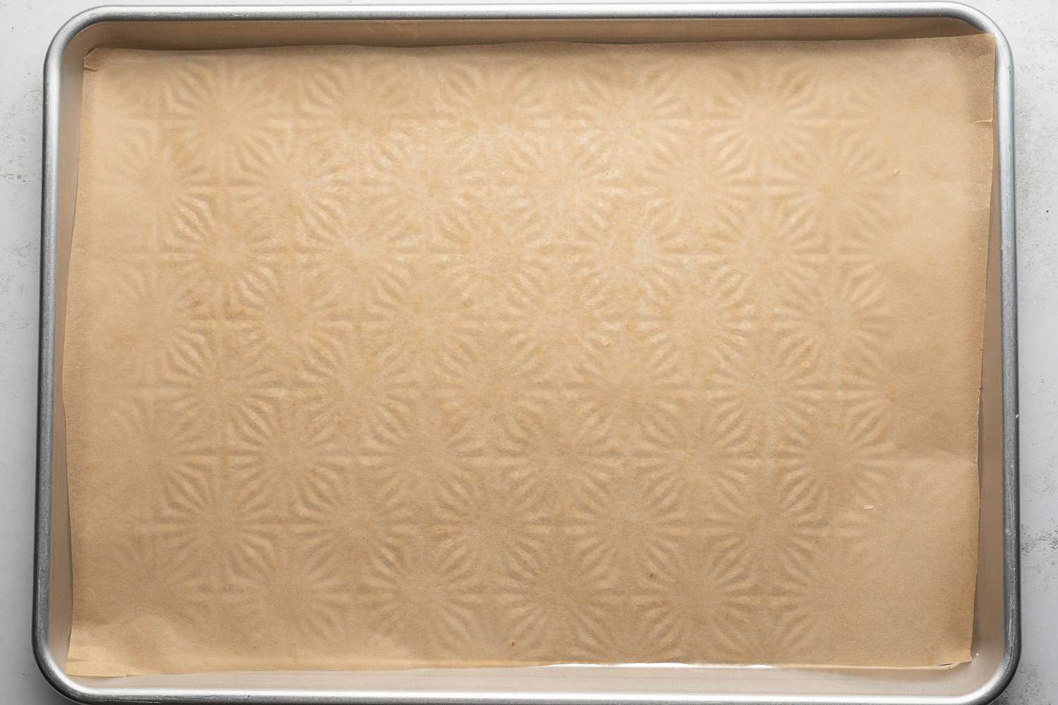 Parchment paper lined baking sheet 