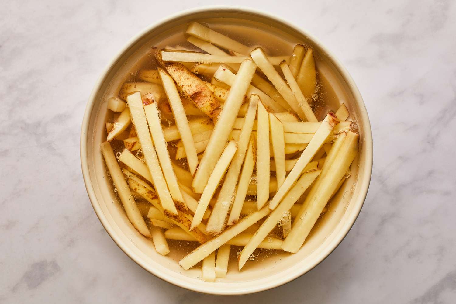 Soaking potatoes for fries