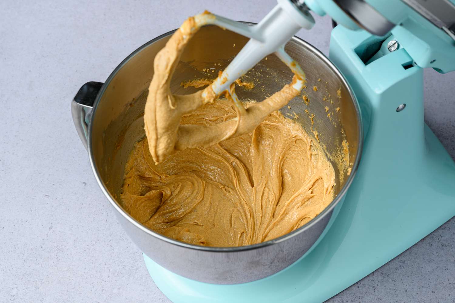 egg whites blended into creamed sugar and peanut butter in stand mixer