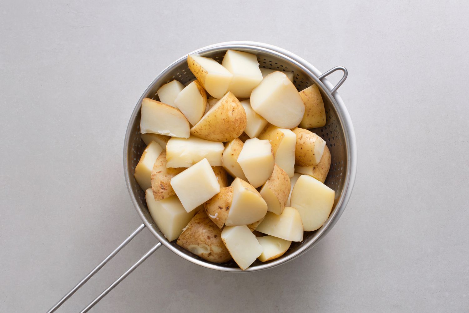 potatoes in a colander 