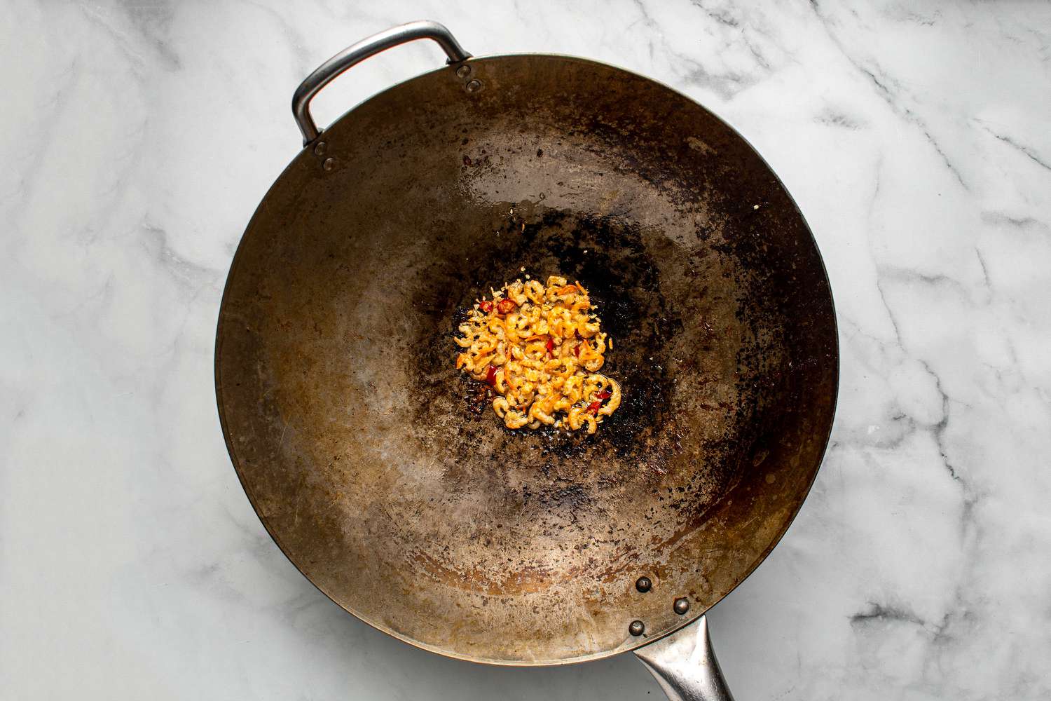 add dried shrimp to the chili mixture in the wok 