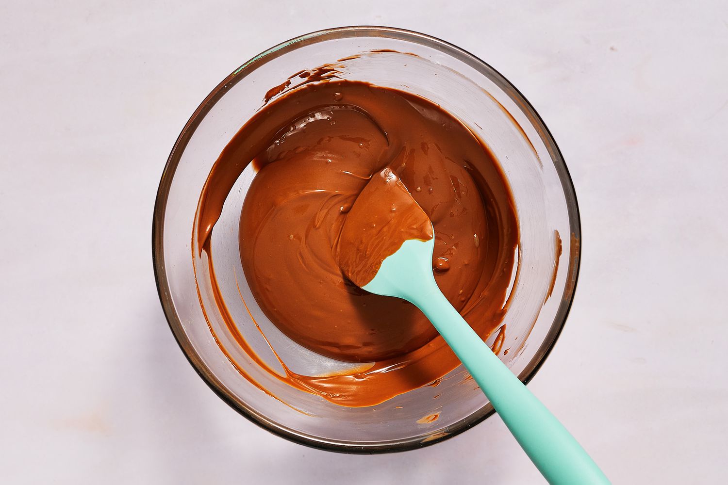 chocolate melted in bowl with spatula