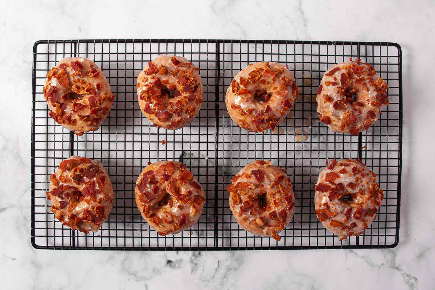 Maple Bacon Doughnuts on a cooling rack