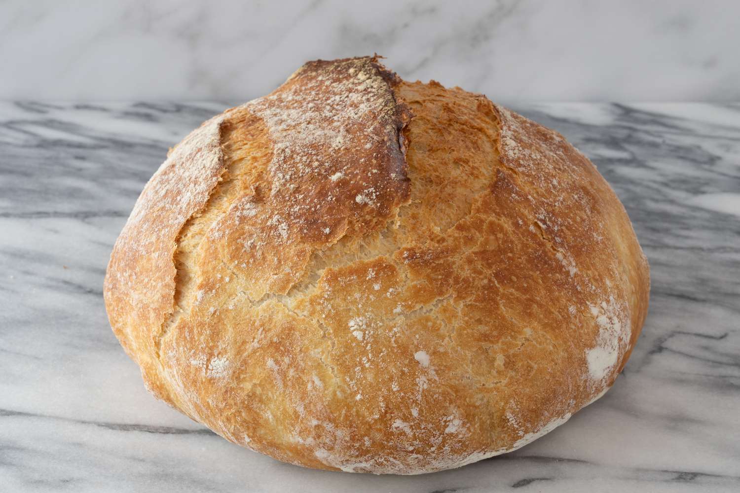 Baked no-knead bread boule loaf