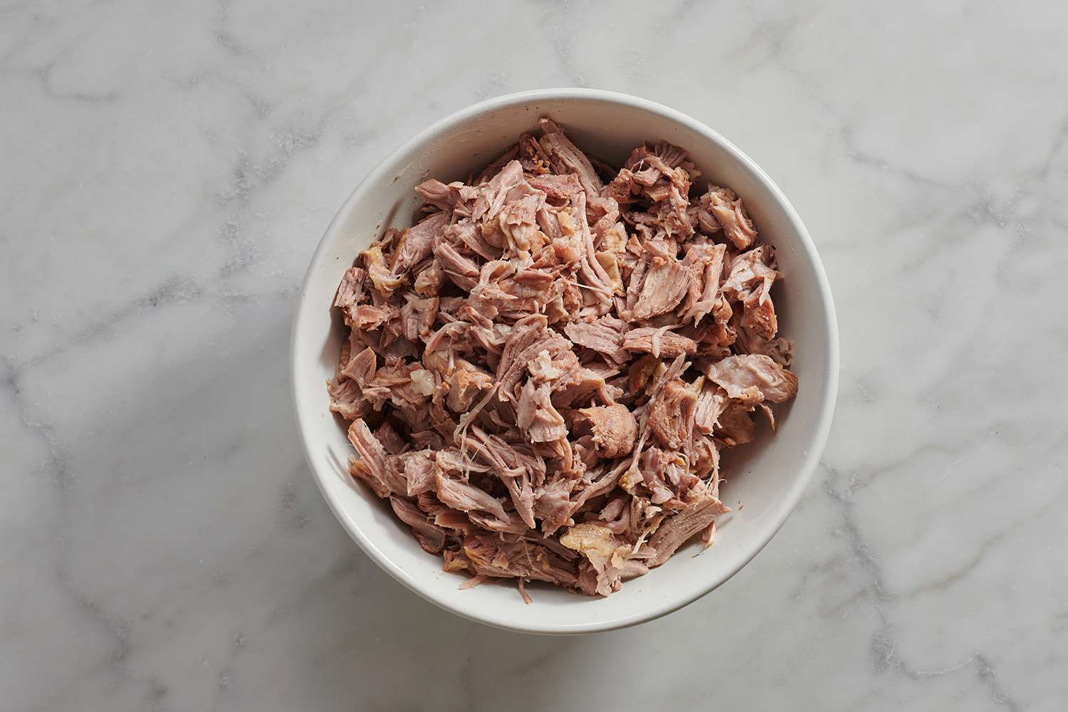shredded pork meat in a bowl