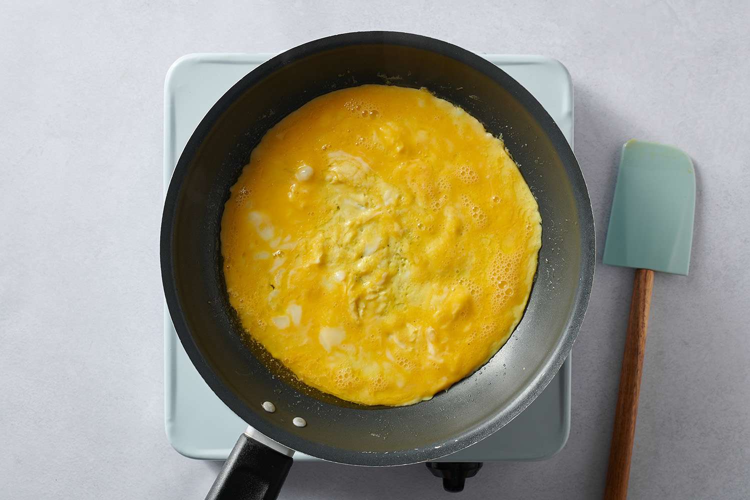 eggs cooking in skillet