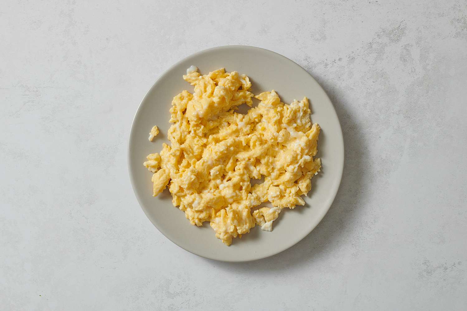 A small plate of cooked eggs
