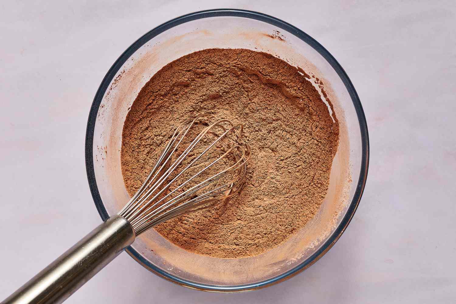 baking soda and salt whisked into cake flour and cocoa powder in bowl