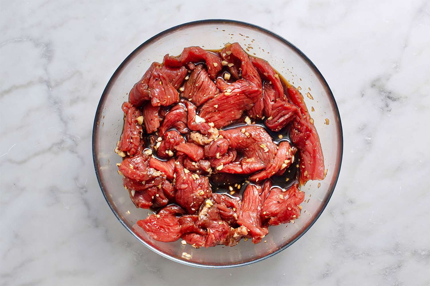 Meat and marinade in a bowl 