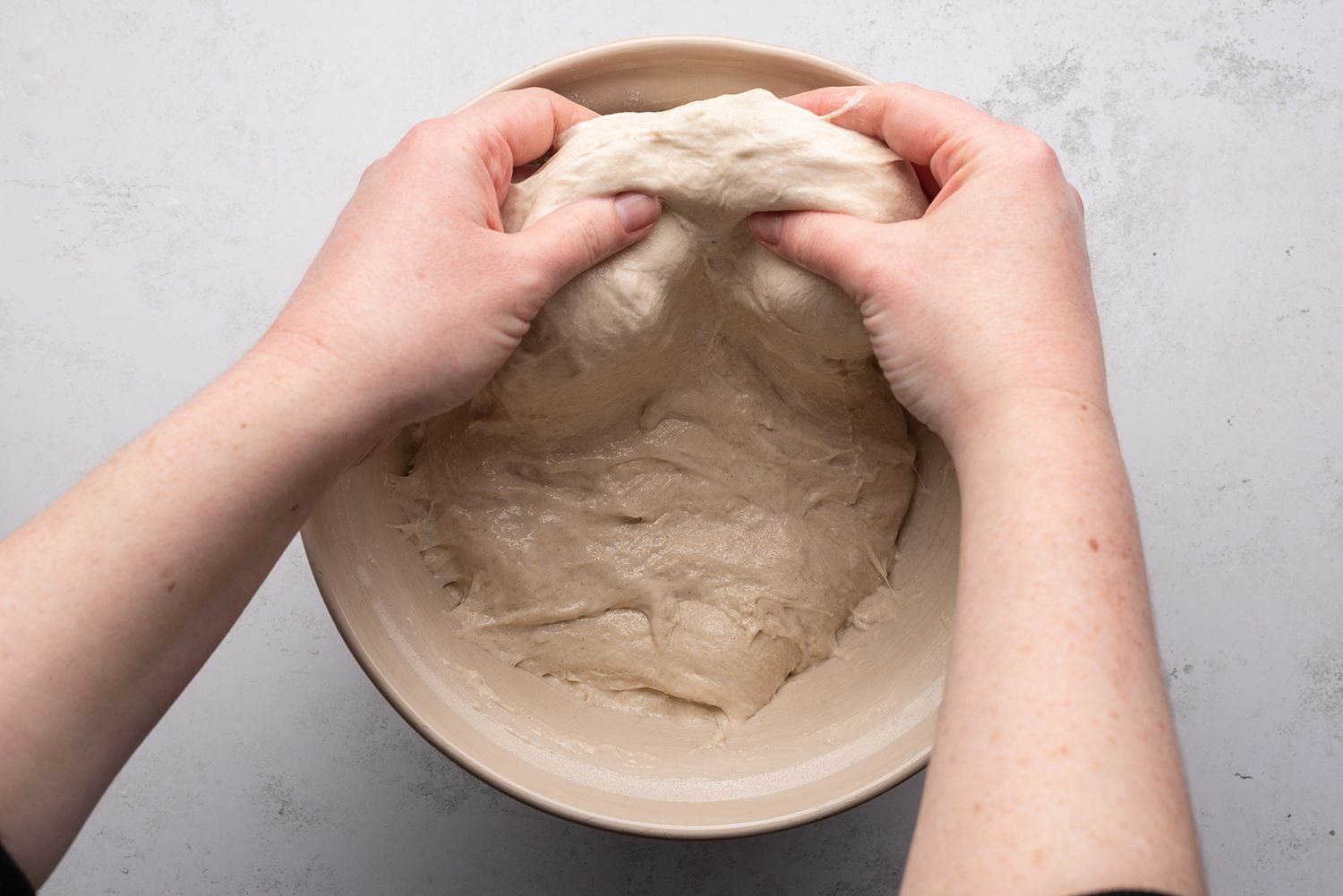 Stretch and fold the dough in the bowl