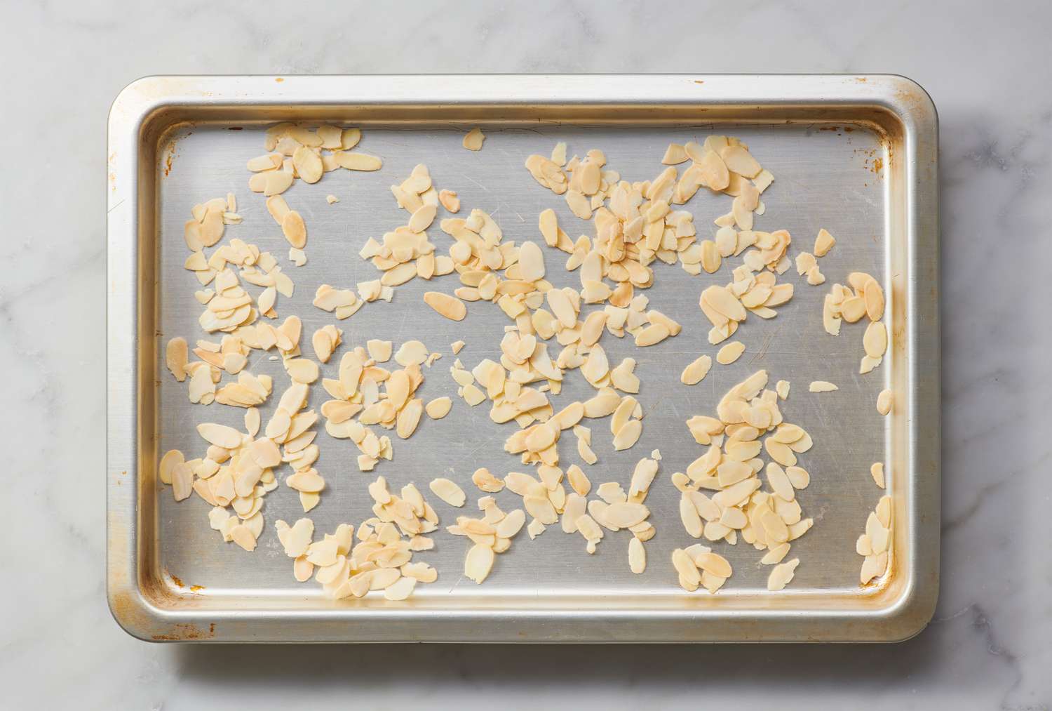 almonds lightly toasted on a sheet tray