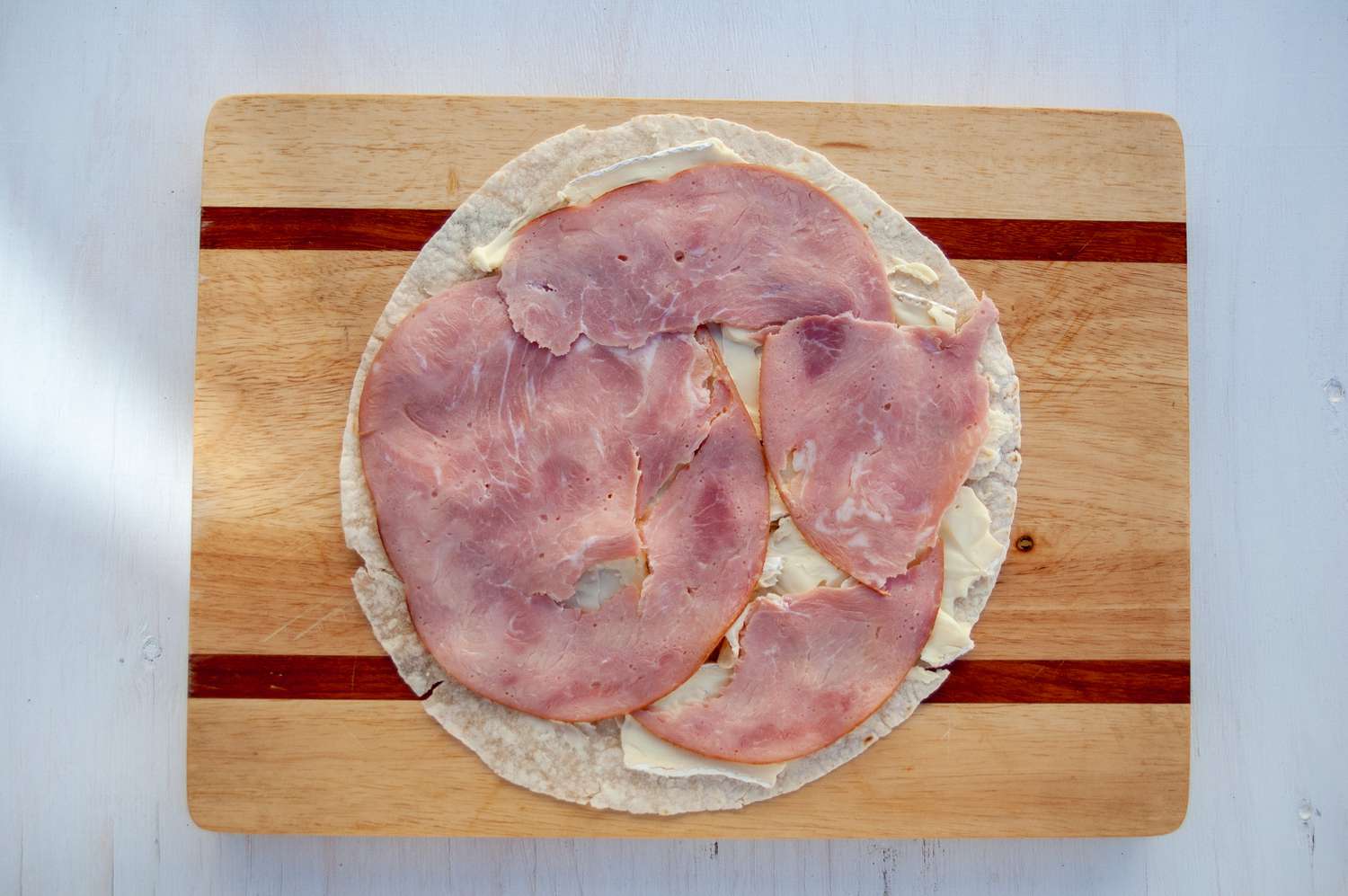 ham and brie on a tortilla