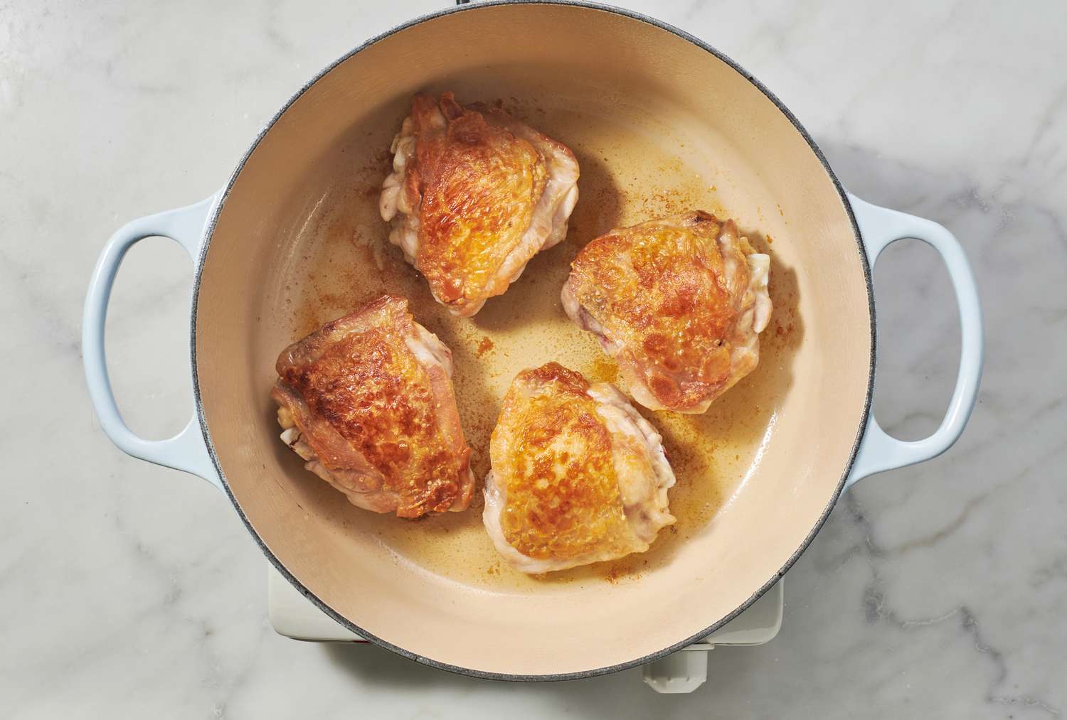 seared chicken thighs in dutch oven