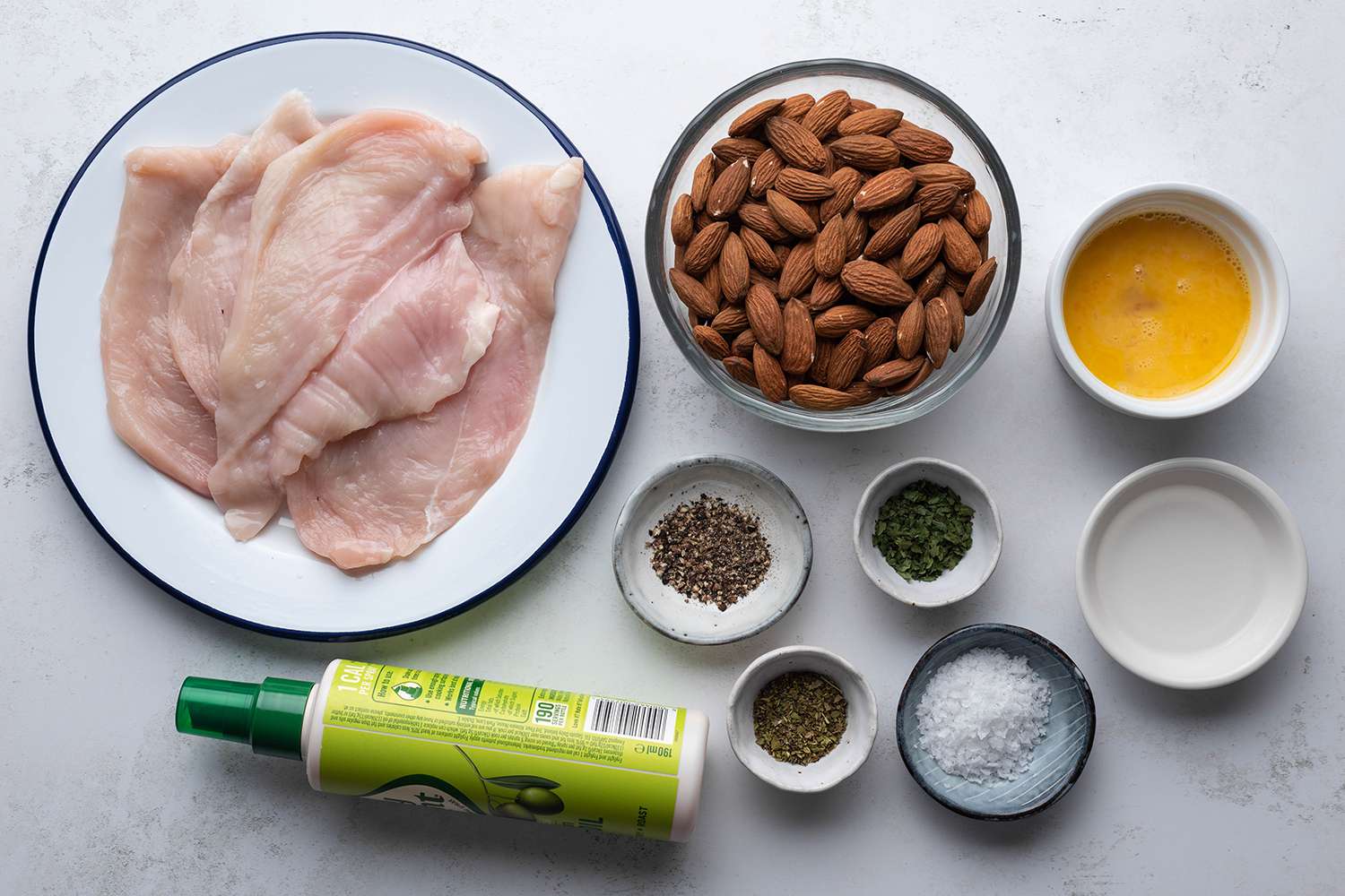 Almond Crusted Chicken ingredients in bowls 