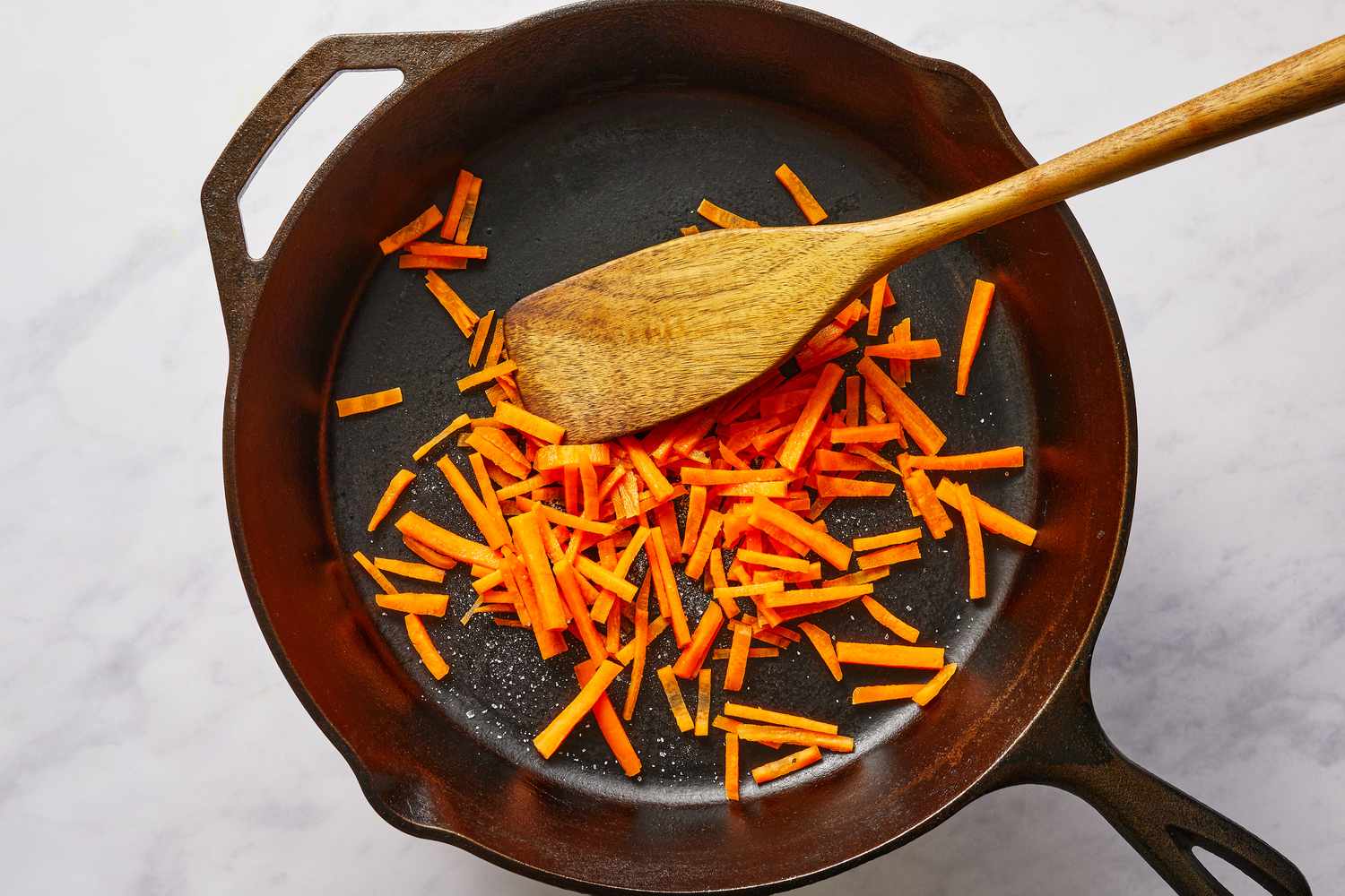 Sauté carrots with salt