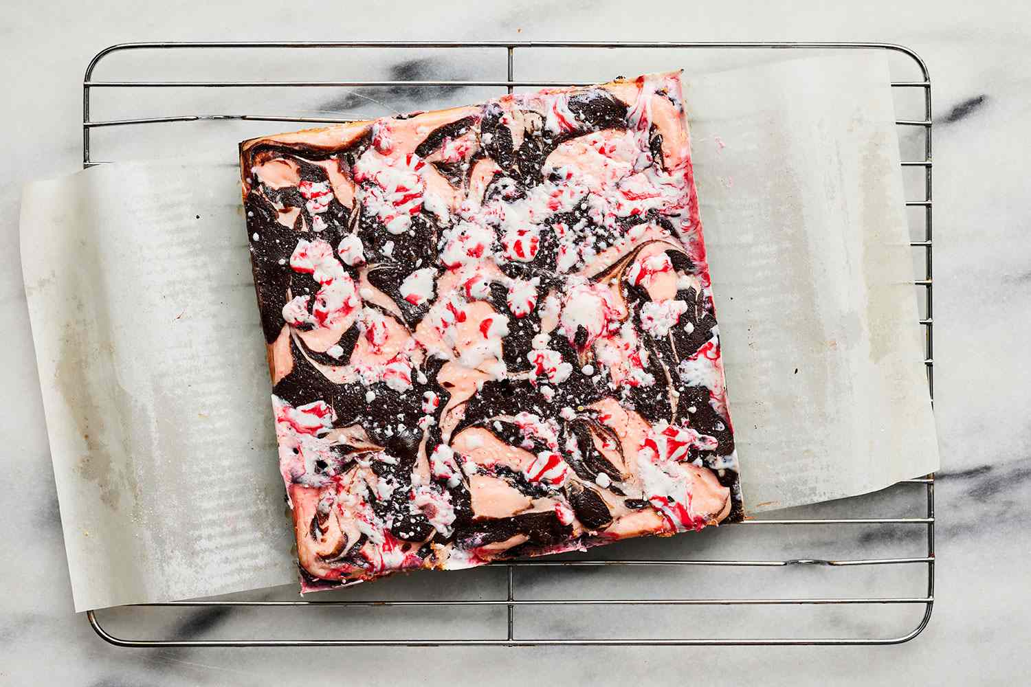 finished peppermint swirl brownie lifted from pan using parchment paper