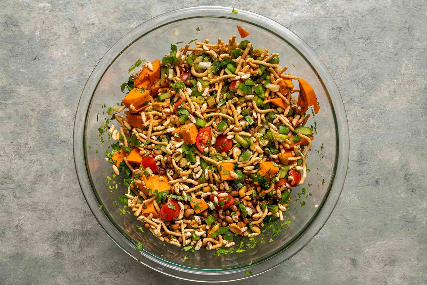 Peanuts and Peas Bhel Puri in a glass bowl 