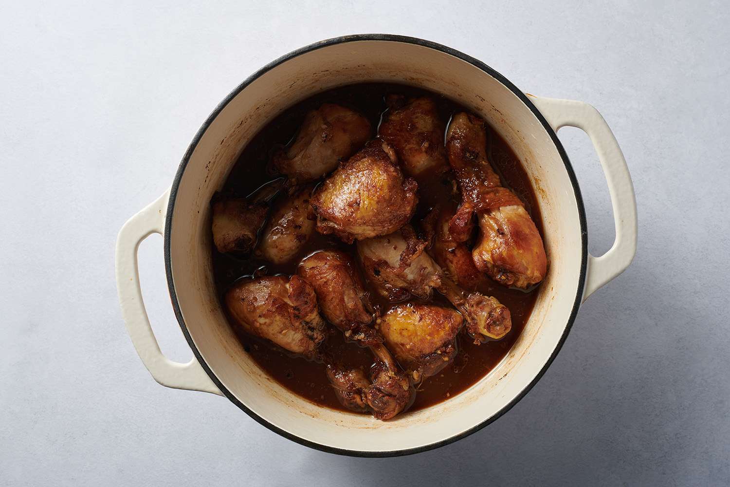 cooked chick in dutch oven with broth