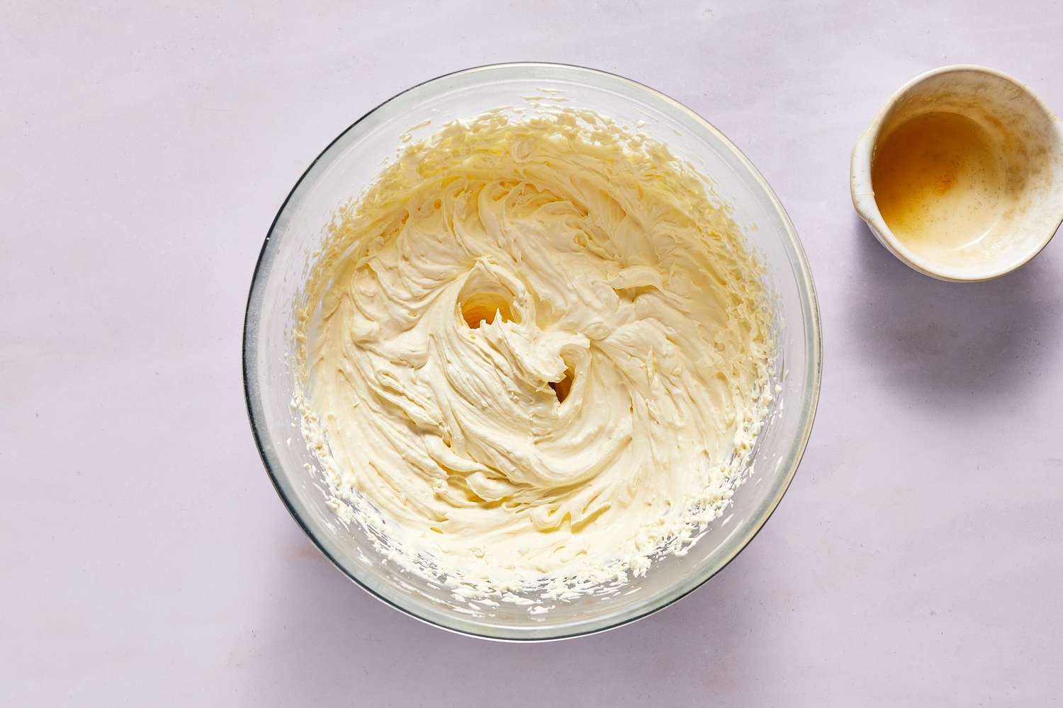 liquid gelatin added to bowl of whipped cream