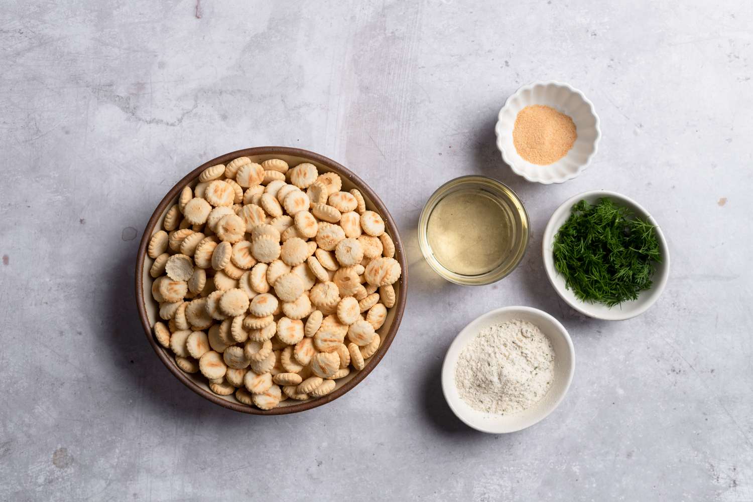 Ingredients to make ranch oyster crackers