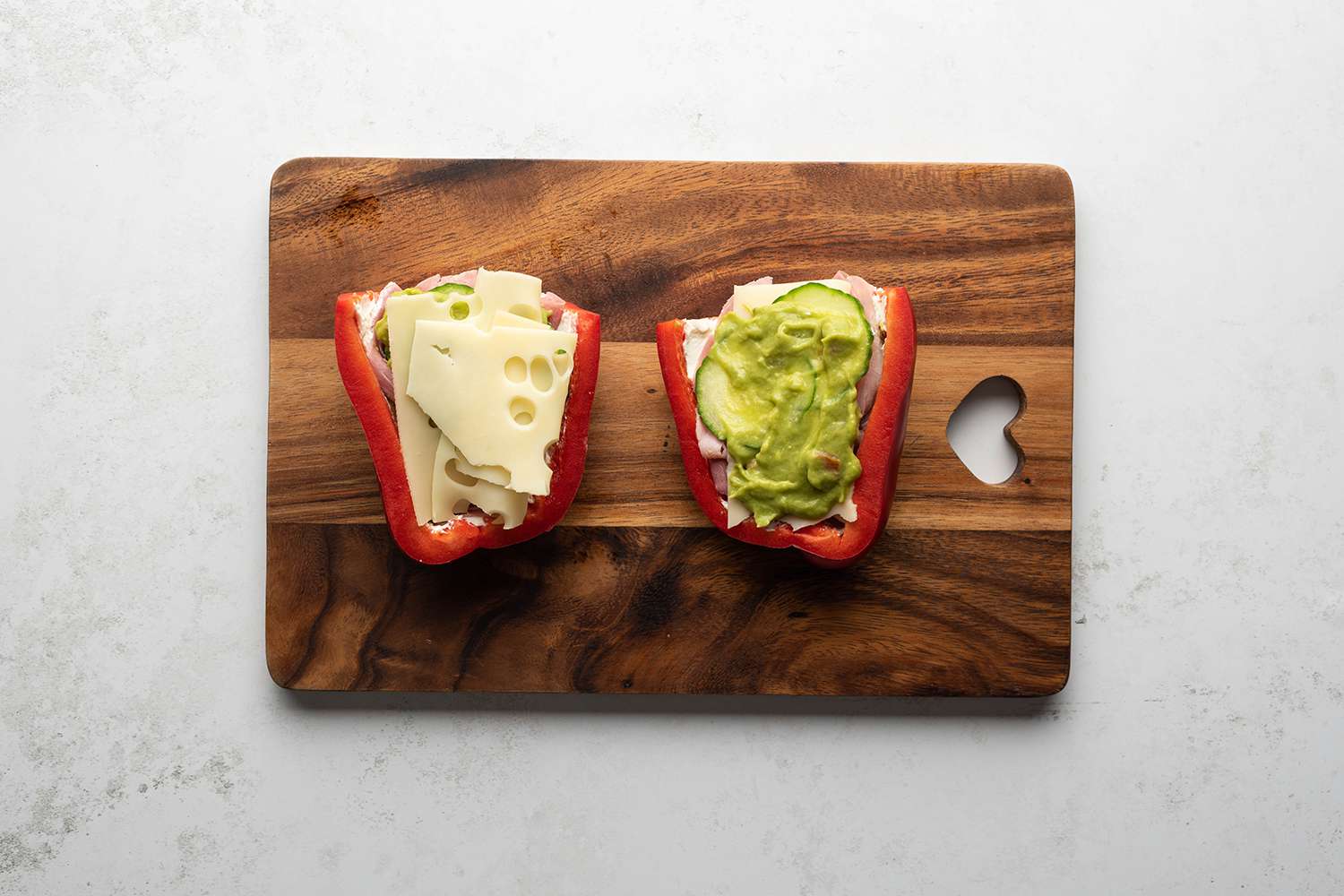 Ham, cheese, cucumbers, cream cheese and guacamole on the pepper 