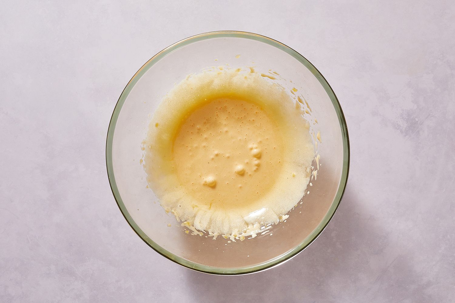 Egg yolks and sugar mixture in a bowl 