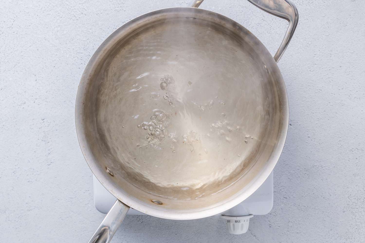 A pot of salted, boiling water