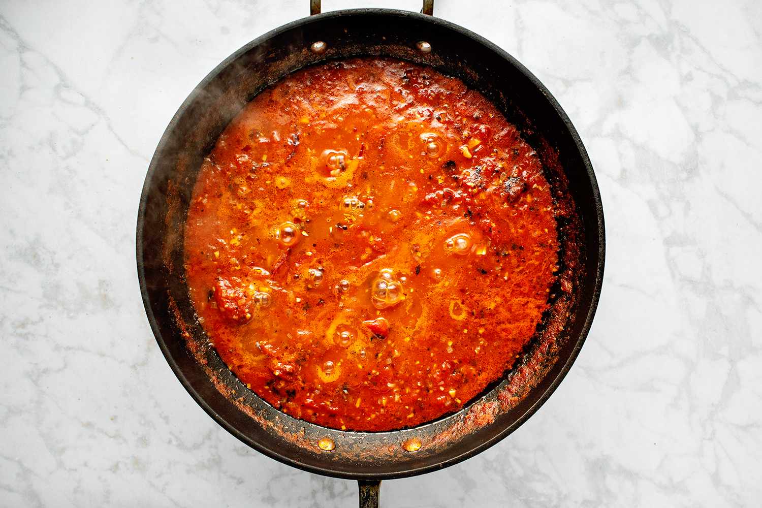 Arrabbiata Sauce cooking in a pan 