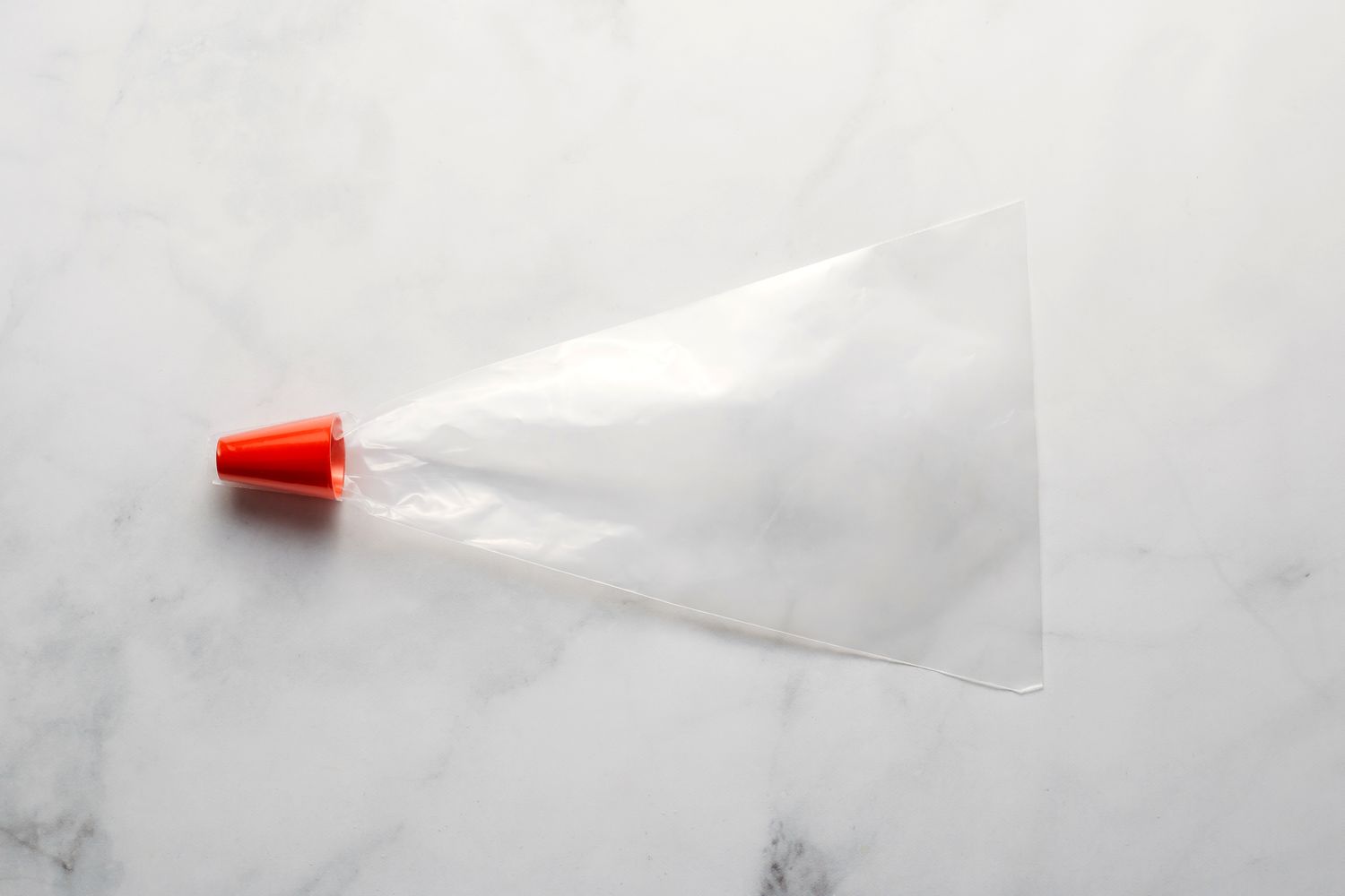 Piping bag fitted with a nozzle