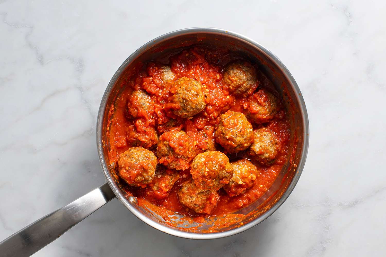 A pot of meatballs in tomato sauce