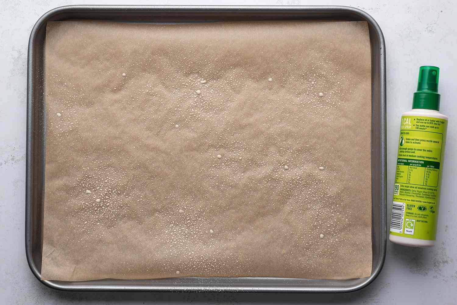 Greased and parchment paper lined baking sheet 