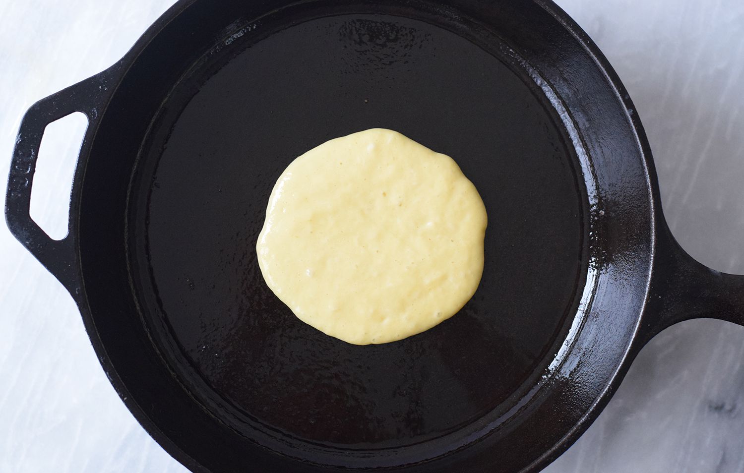 Cook pancakes on a cast-iron pan
