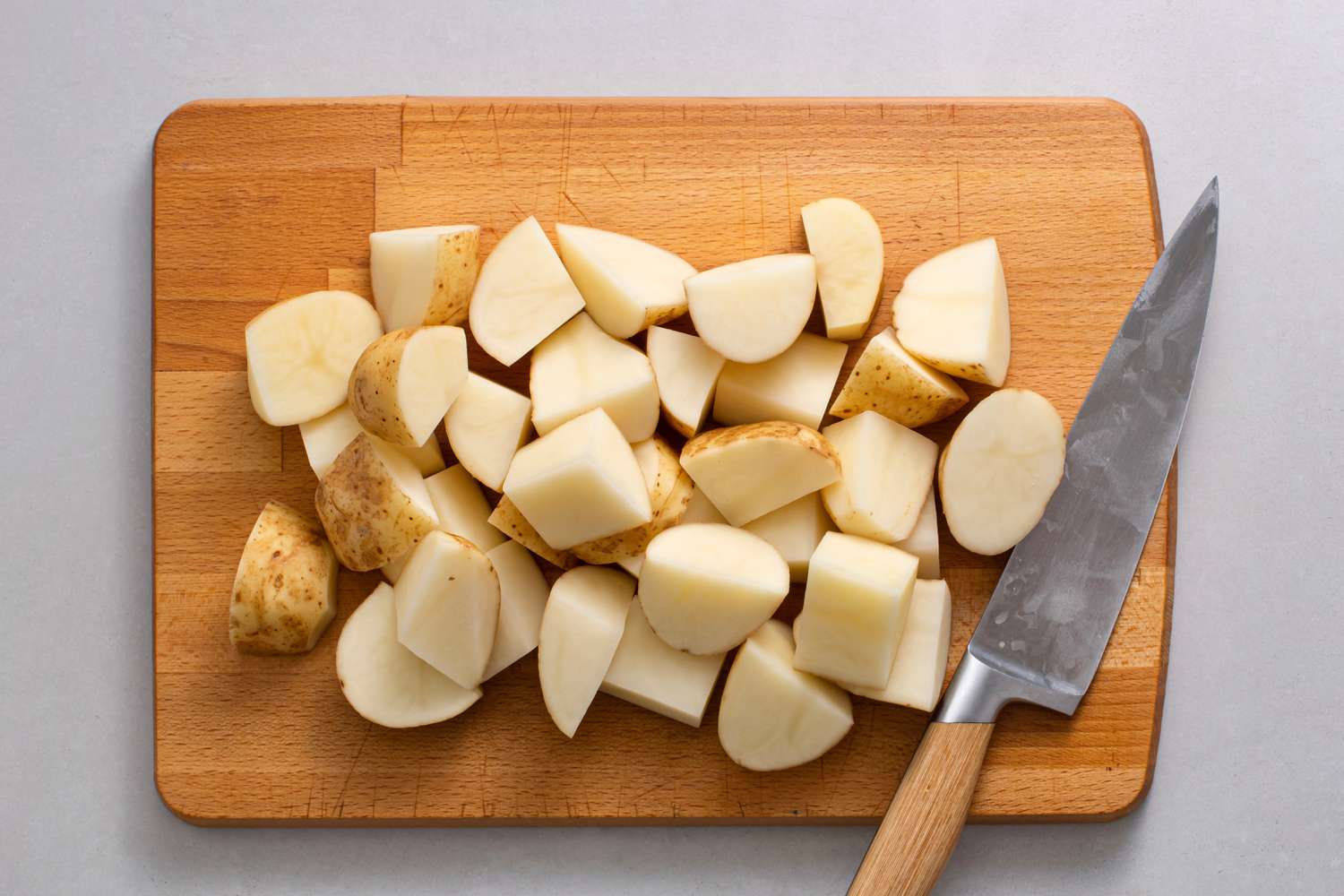 potatoes on a cutting board 