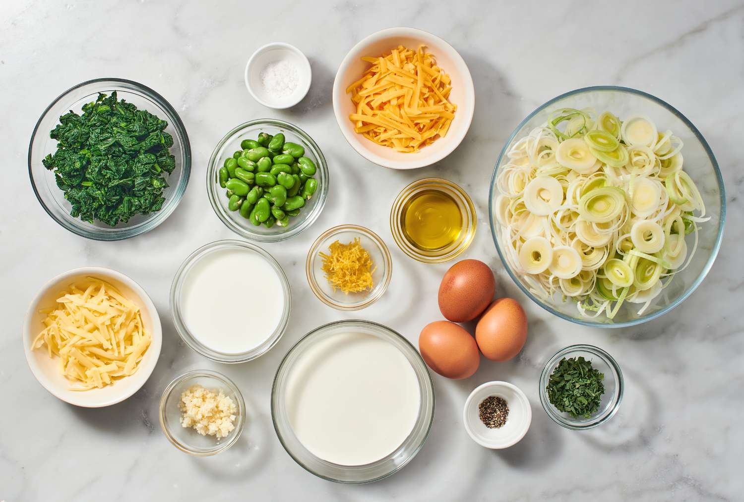 Ingredients to make the filling of a coronation quiche