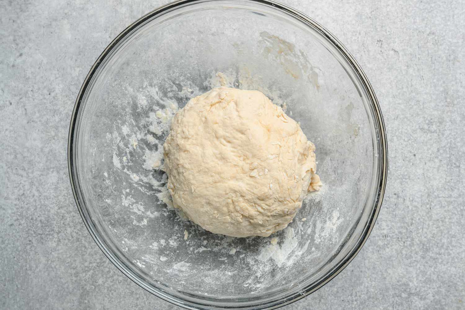 A bowl with a ball soft dough