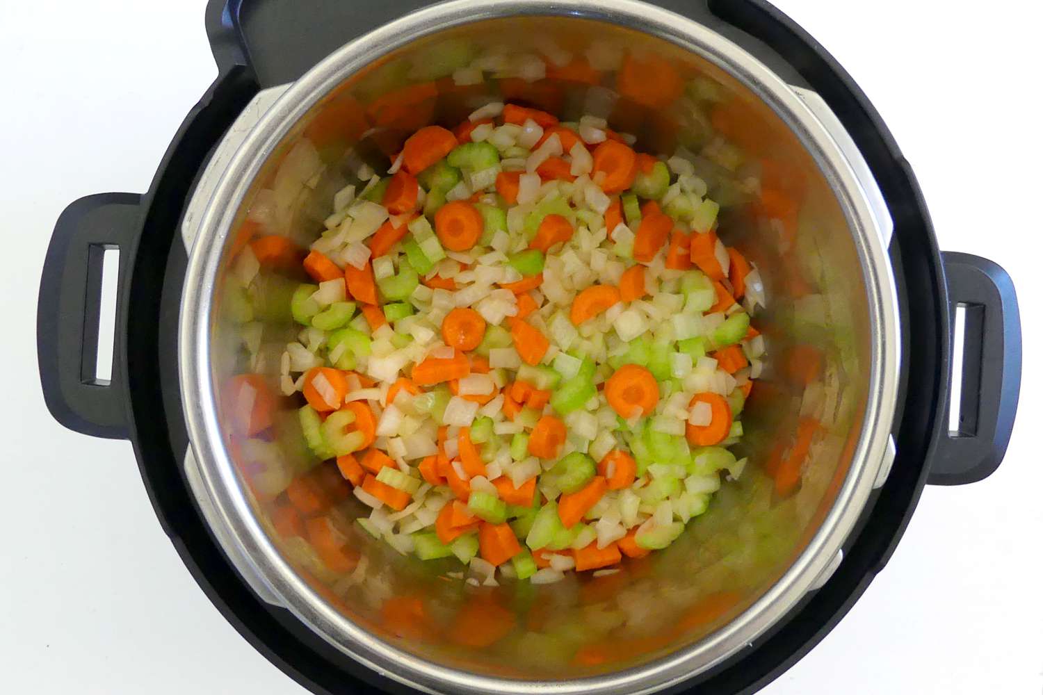 Saute the onion, carrot, and celery