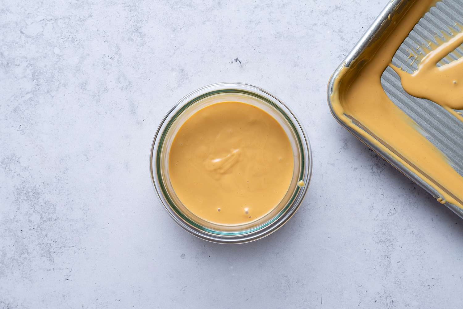 Melted blonde chocolate in a jar