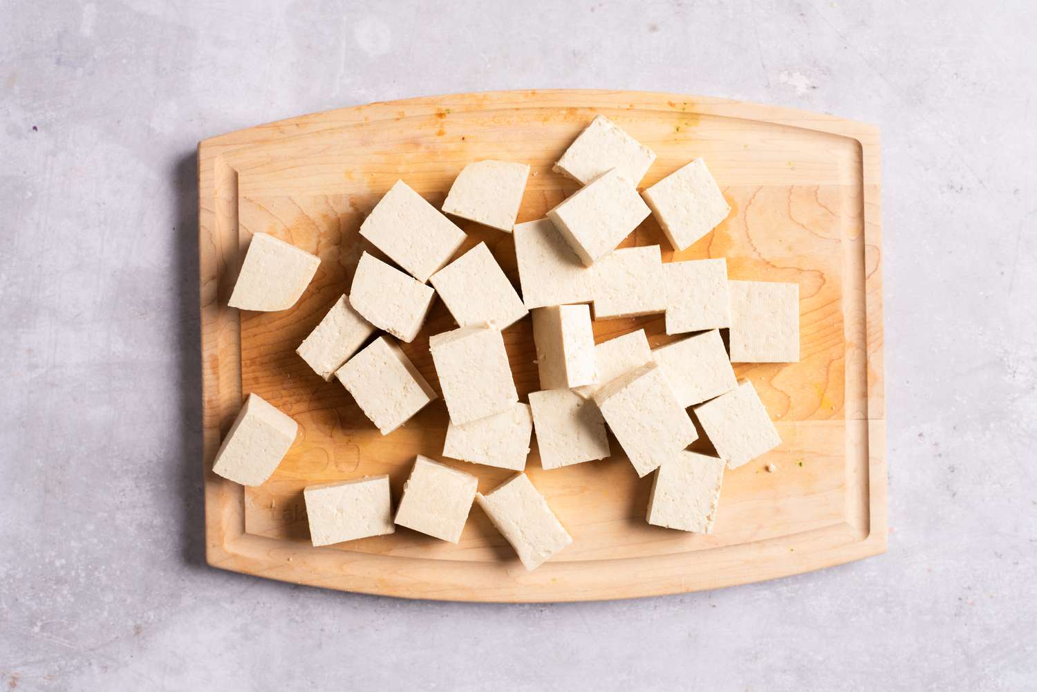 Slices of tofu on a cutting board