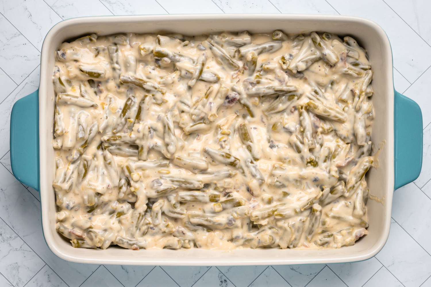 baking dish with bacon and cheddar green bean casserole filling