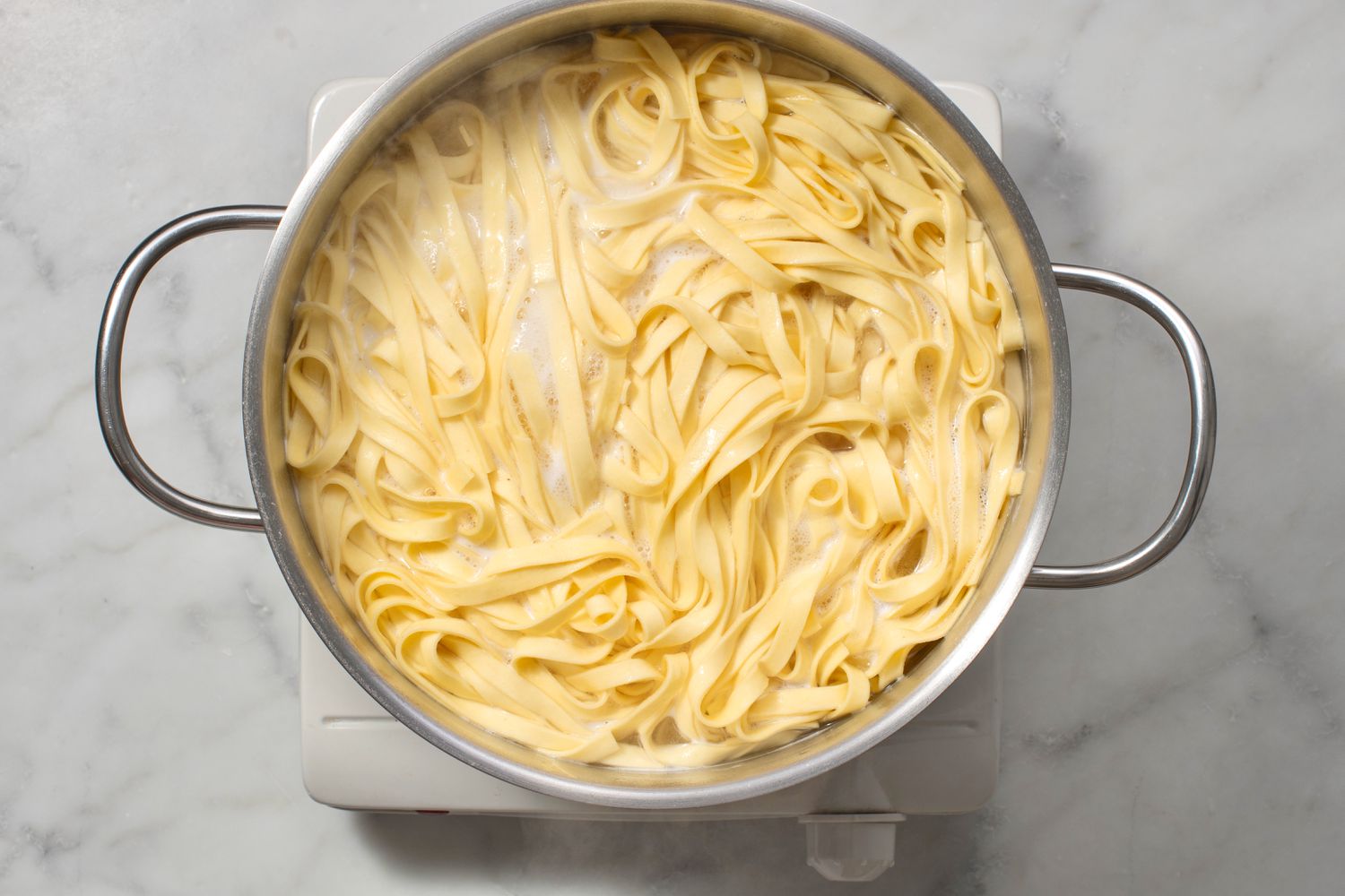 Pasta boiling in a large pot