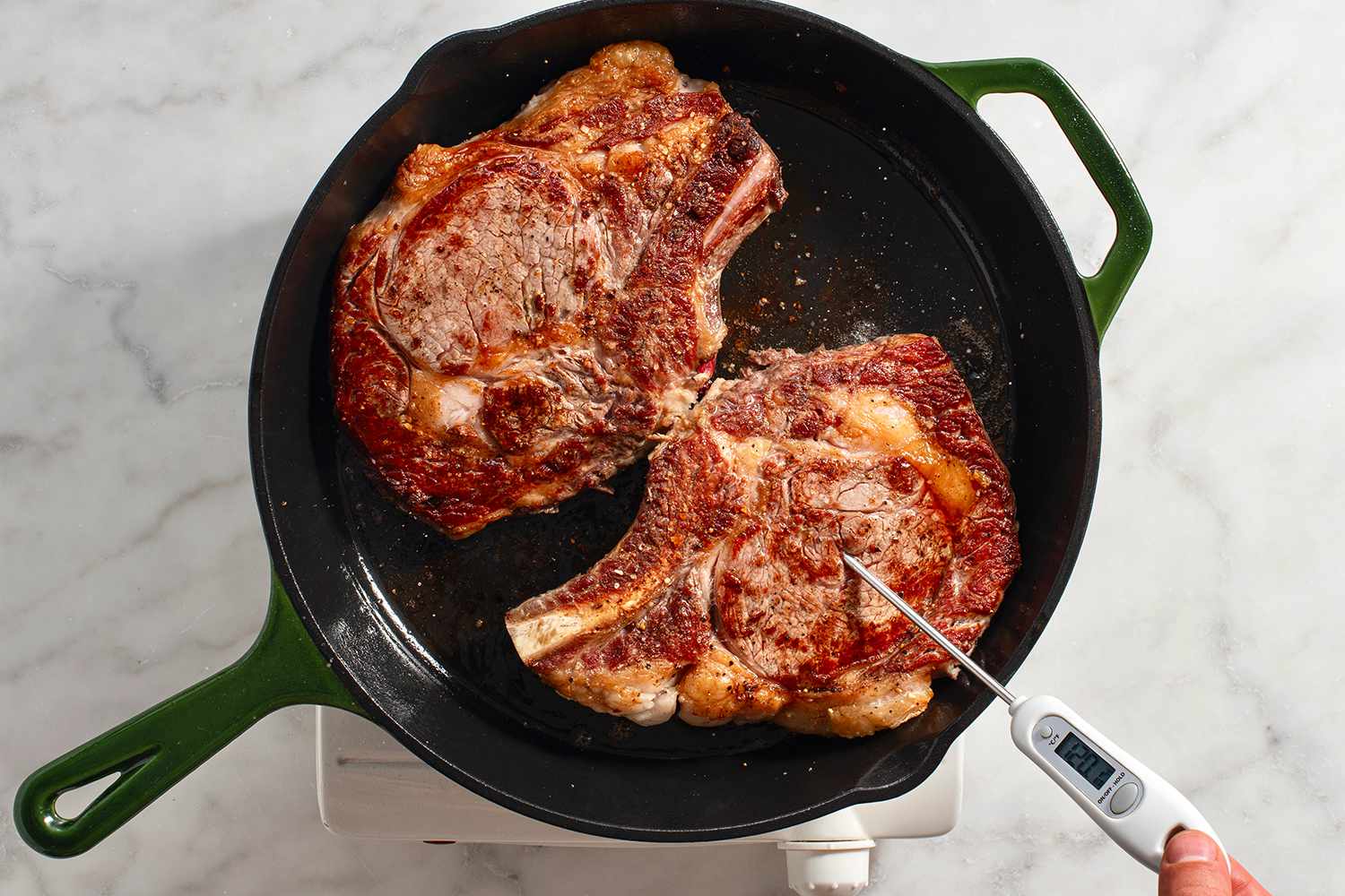 seared steaks in cast iron skillet 