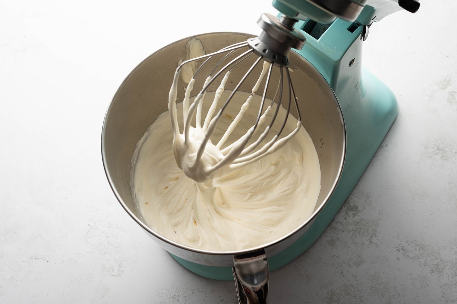 Gelatin mixture with the cream mixture in a stand mixer 