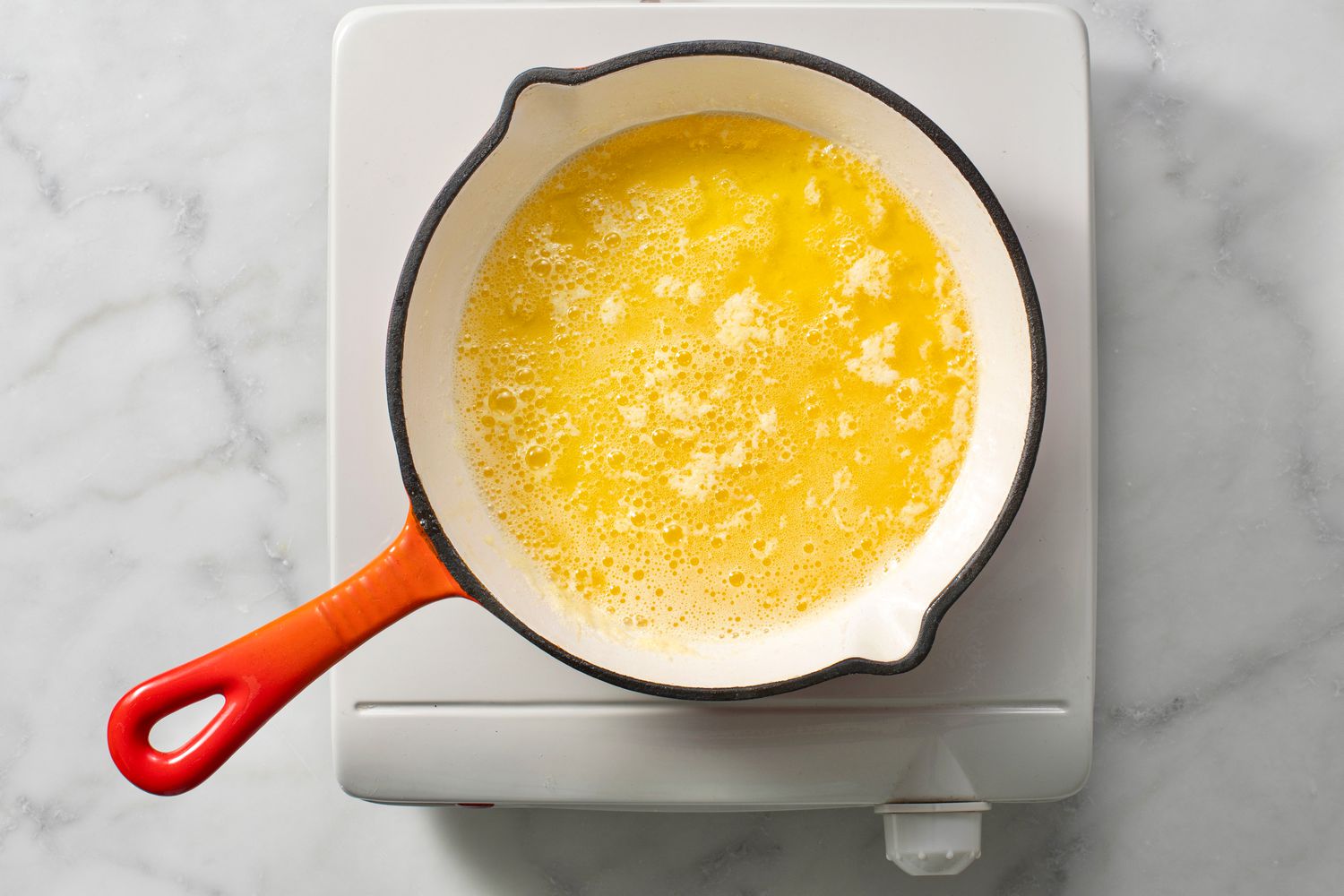 A pan of simmering butter