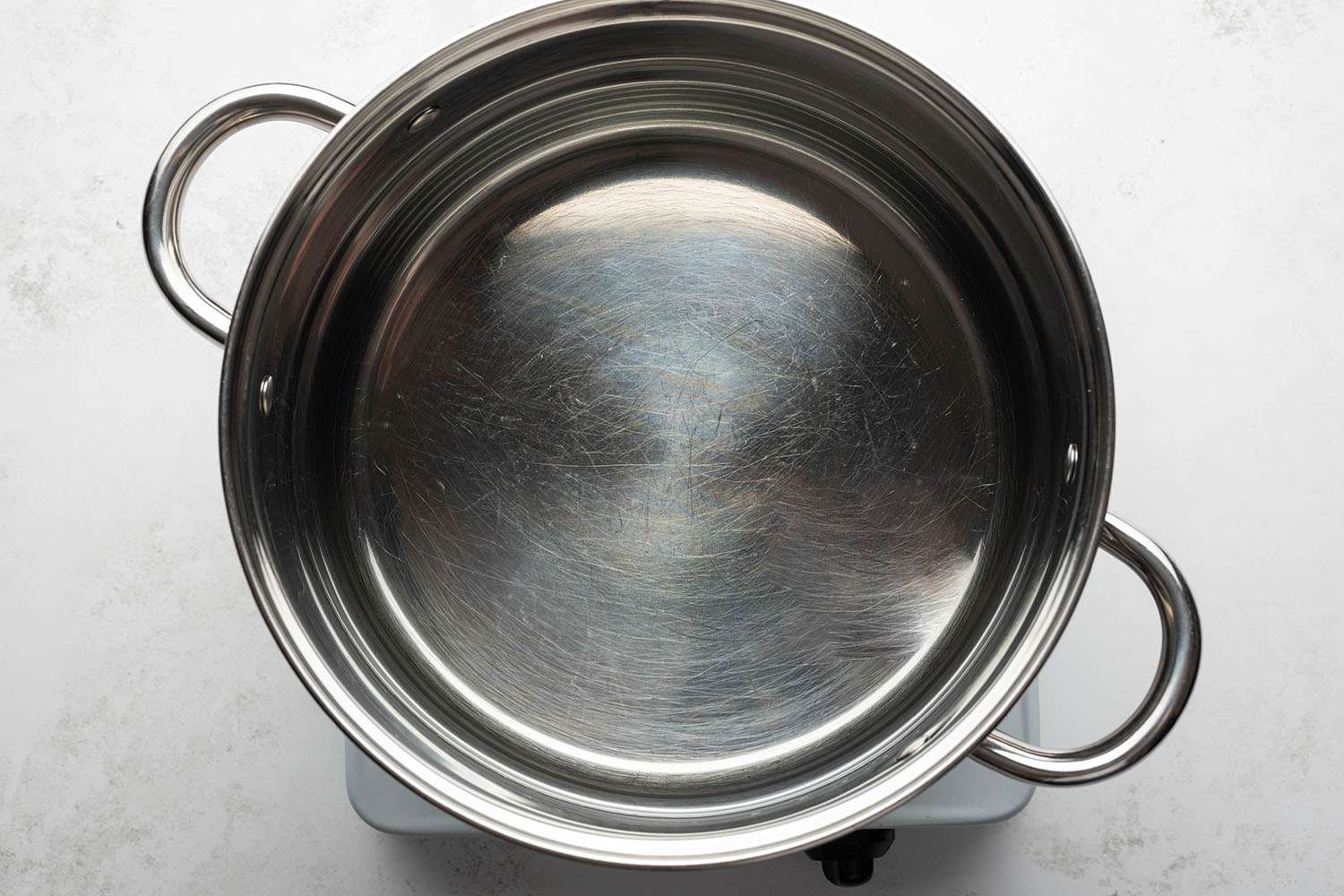 Water in a pot on a burner 