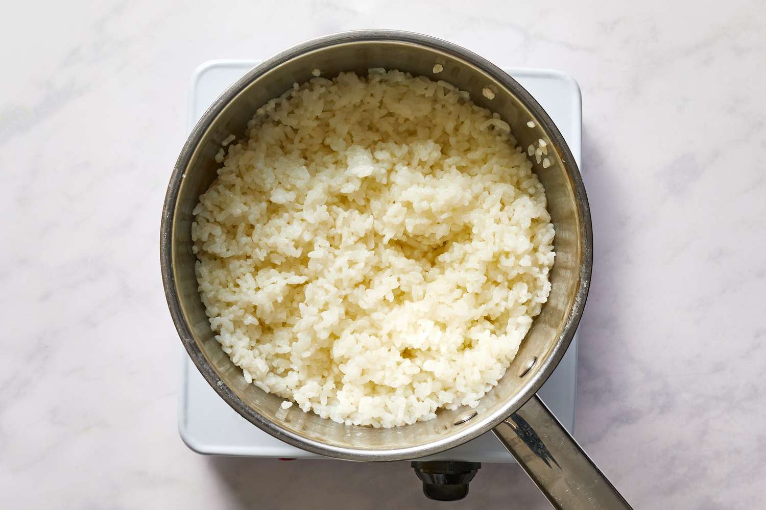 Cook rice on stove in a pot