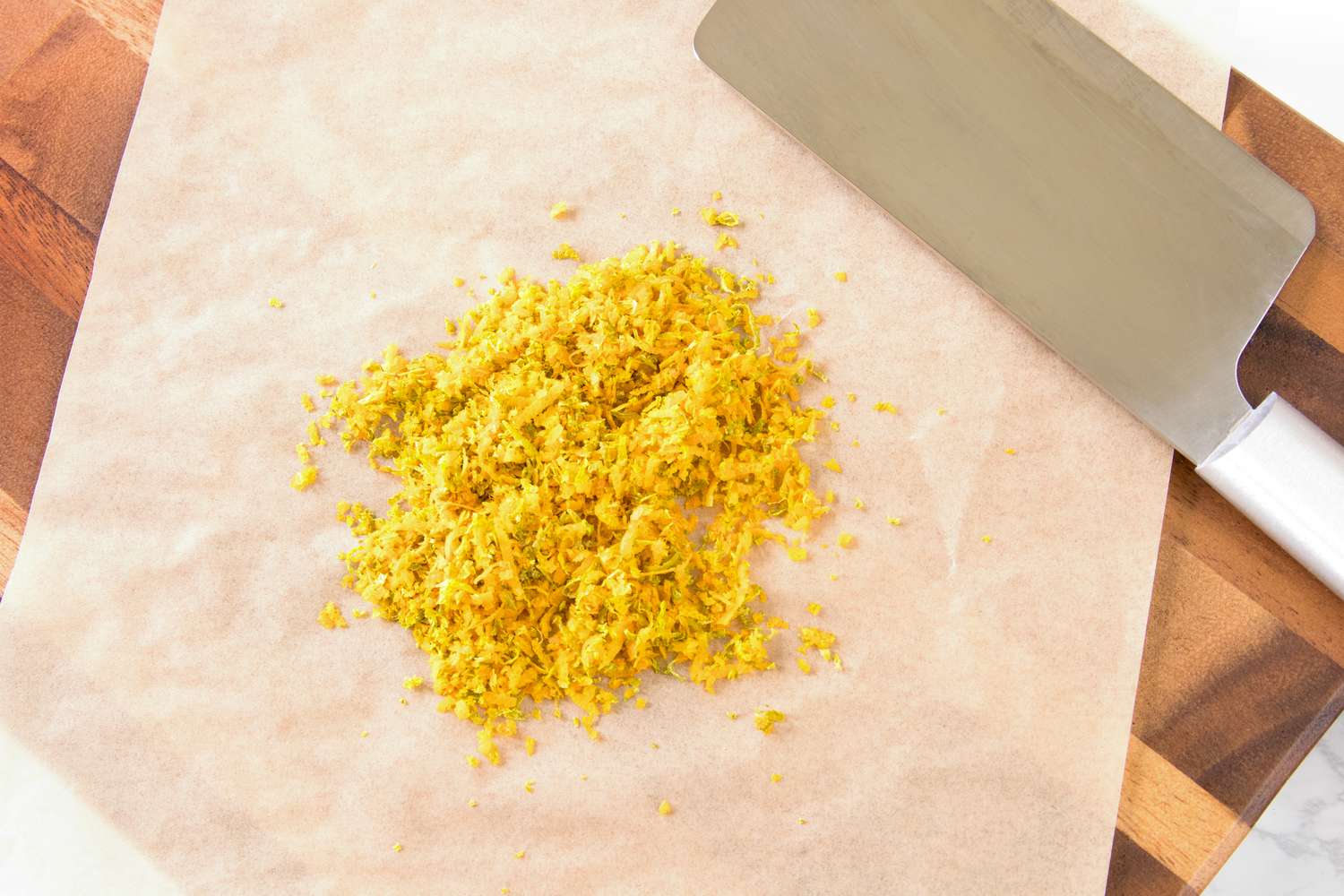 Dried Orange and Lime Zest chopped on a cutting board